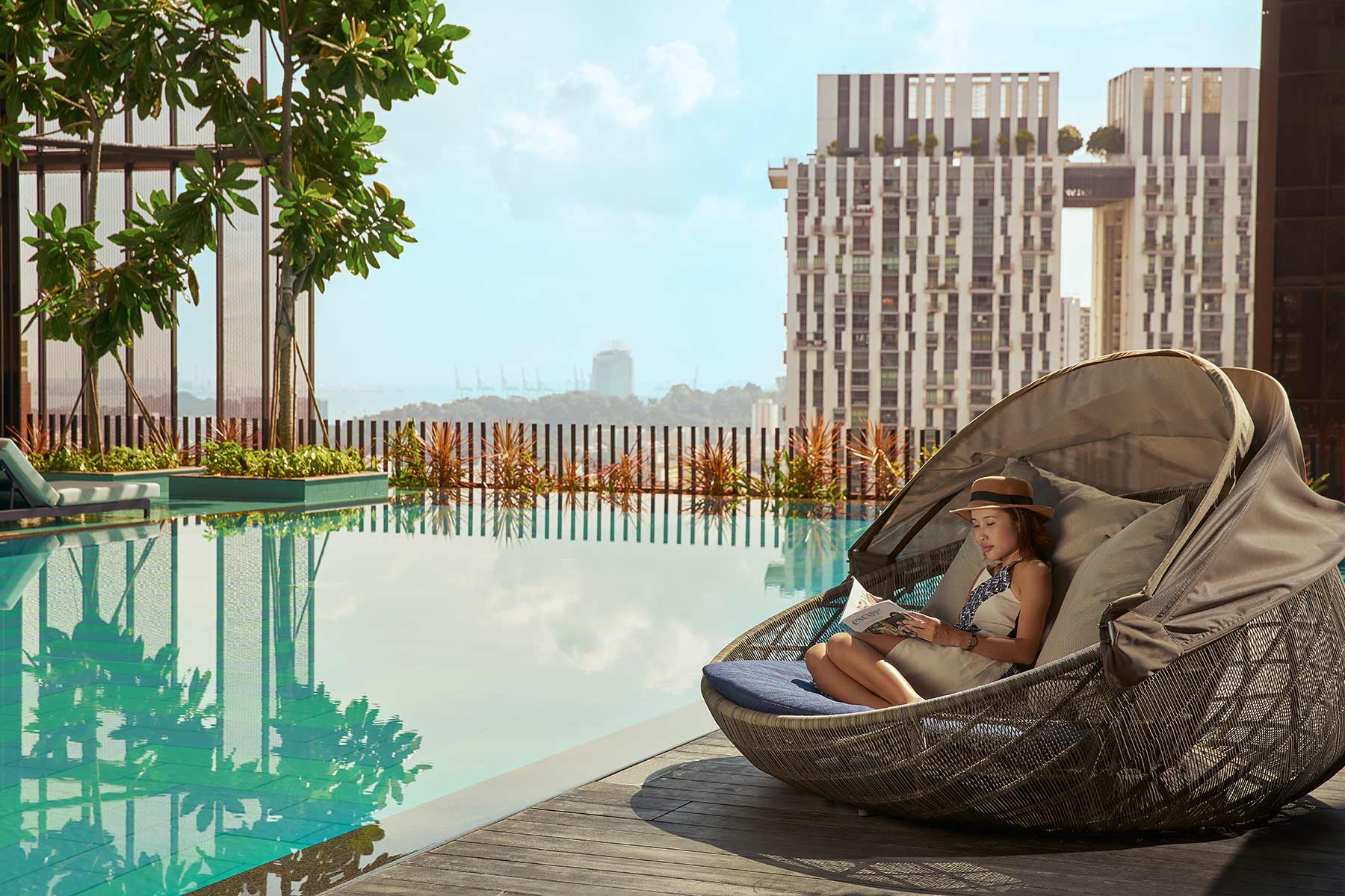 Oasia Hotel Downtown Singapore - Infinity pool, evening view
